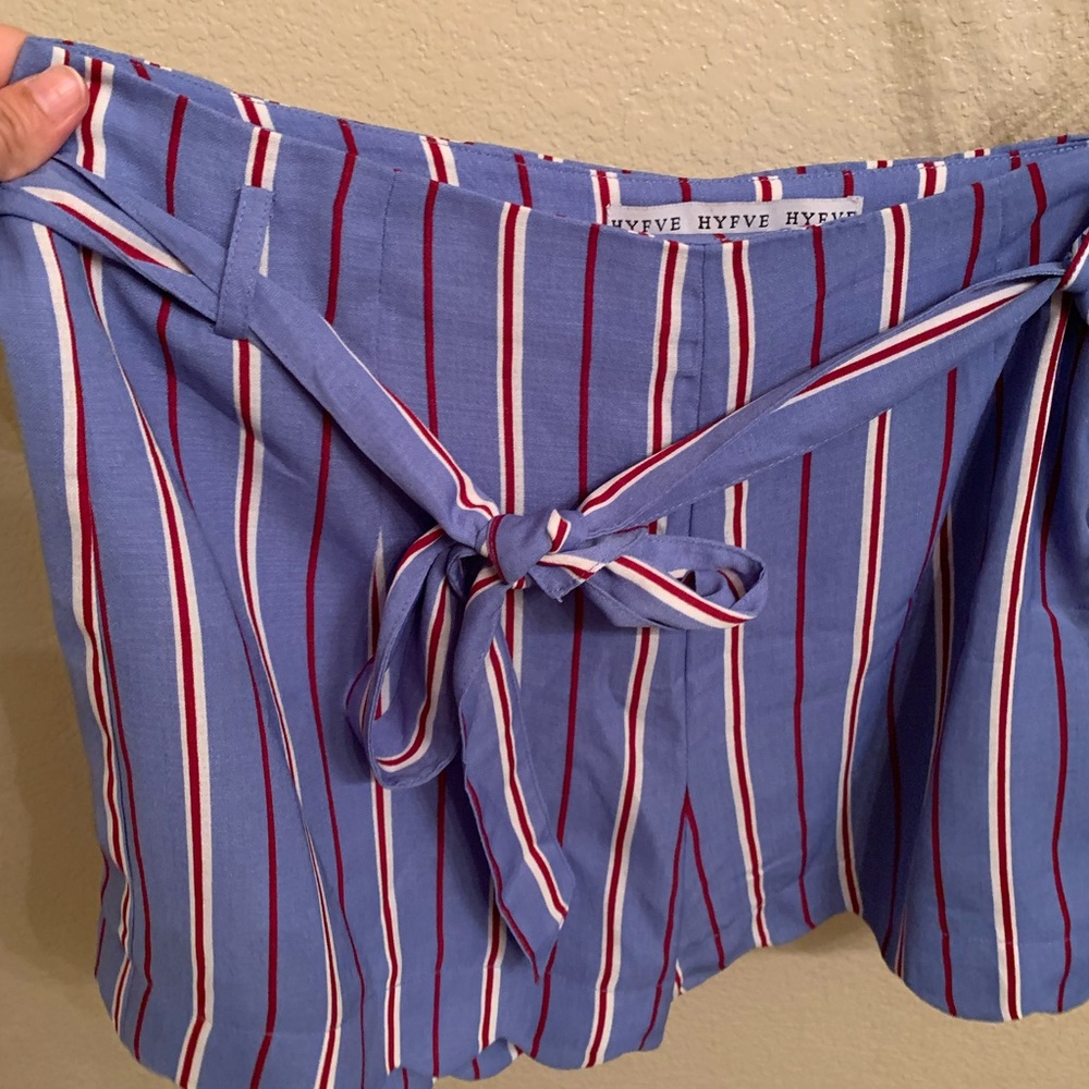 Blue and red striped shorts with belt and scalloped bottom hem